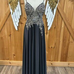 Grey flowy dress with fitted top with detailing